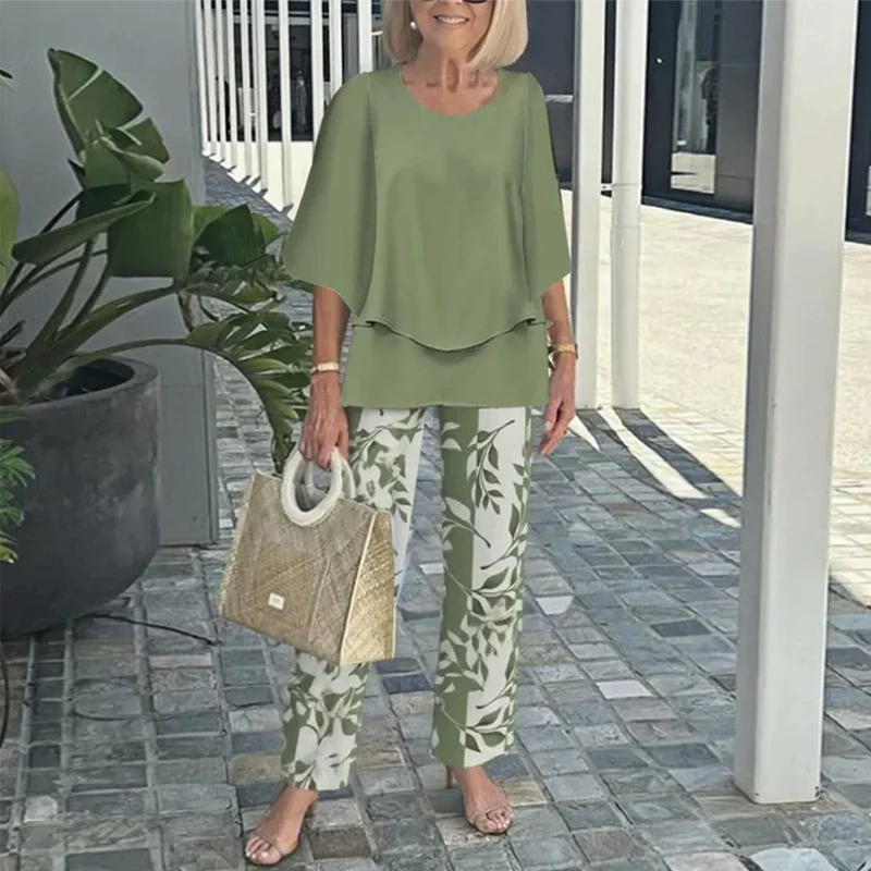 Naiste mustriline pükste ja pluusi komplekt